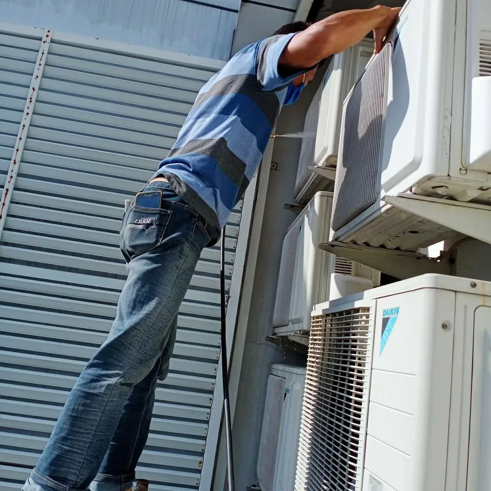 Cleaned air filter panel ready for re-installation in residential split AC